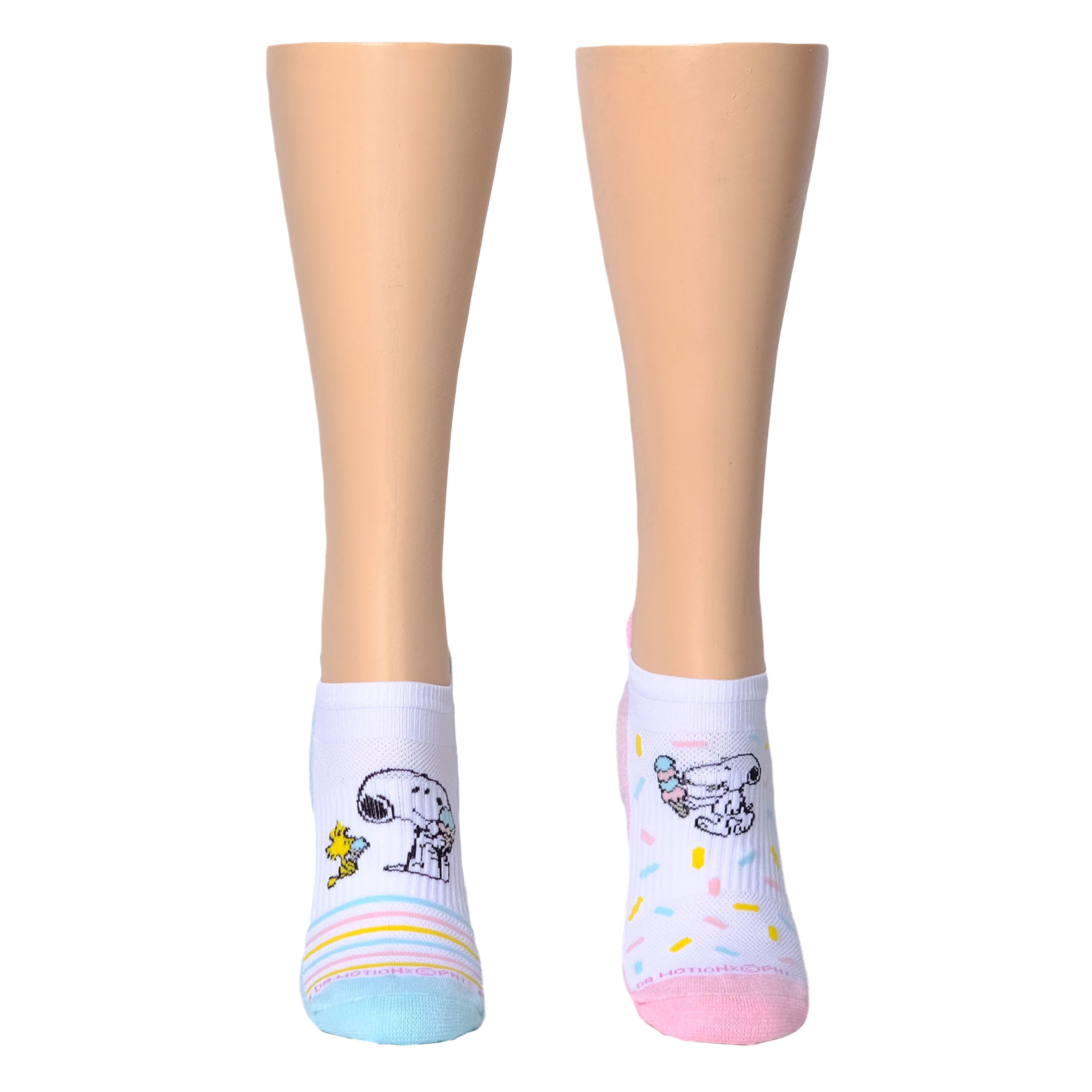 Ankle compression socks featuring Snoopy designs, one with stripes and the other with sprinkles and ice cream.